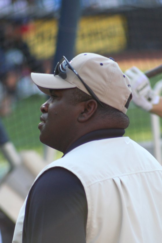 Tony Gwynn in a cap and vest watching batting practice before a Padres game at Petco Park, San Diego, 2006