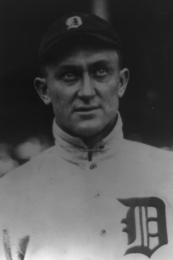 Ty Cobb in a Detroit Tigers cap and white home jersey with the Old English D, head-and-shoulders portrait, 1915